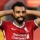 صور| بآزياء غريبة.. محمد صلاح يتجول في شوارع لندن وزوجته وابنتاه مكة وكيان